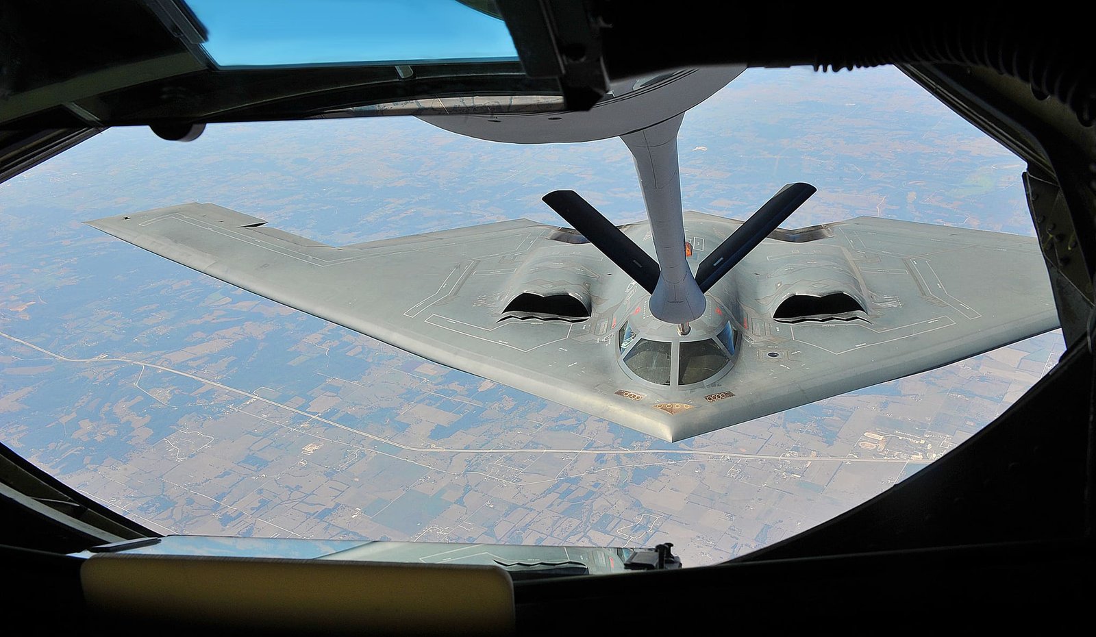 KC-135 Stratotanker refueling B-2 Spirit aircraft over Kansas