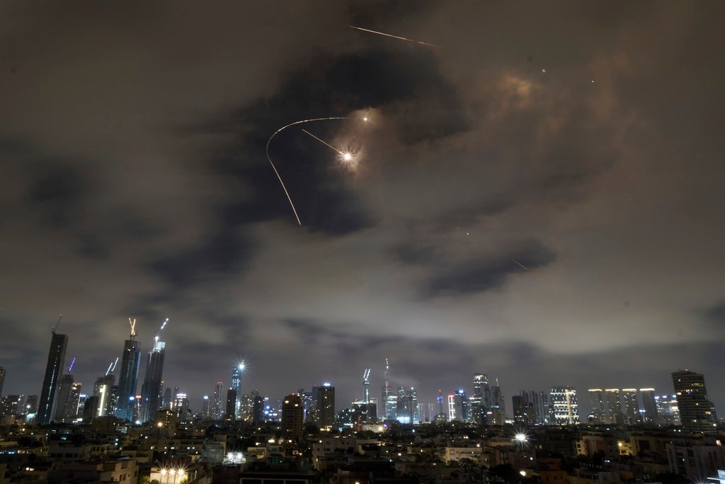 Israeli air defense system intercepting missiles over Tel Aviv
