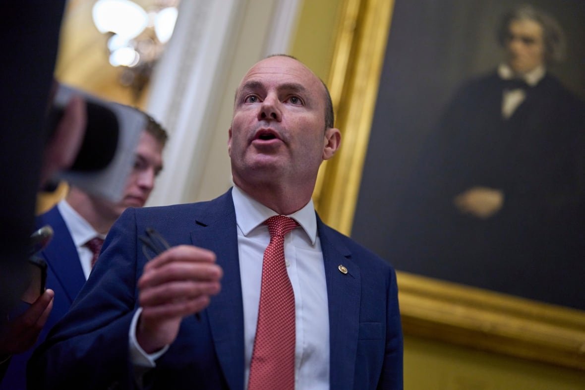 Senator Mike Lee speaking indoors