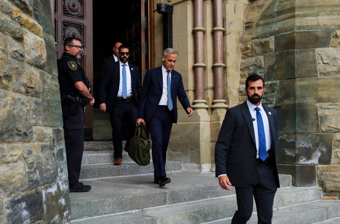 Prime Minister Mark Carney leaving Parliament Hill after security briefing