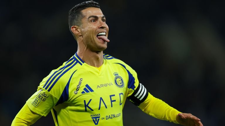 Cristiano Ronaldo celebrating a goal for Al Nassr during a match in Buraydah
