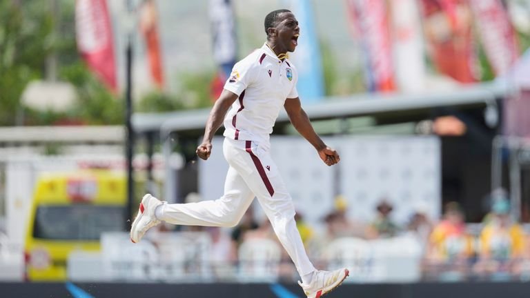 West Indies' Shamar Joseph celebrates taking Australia's wicket during day one at Kensington Oval