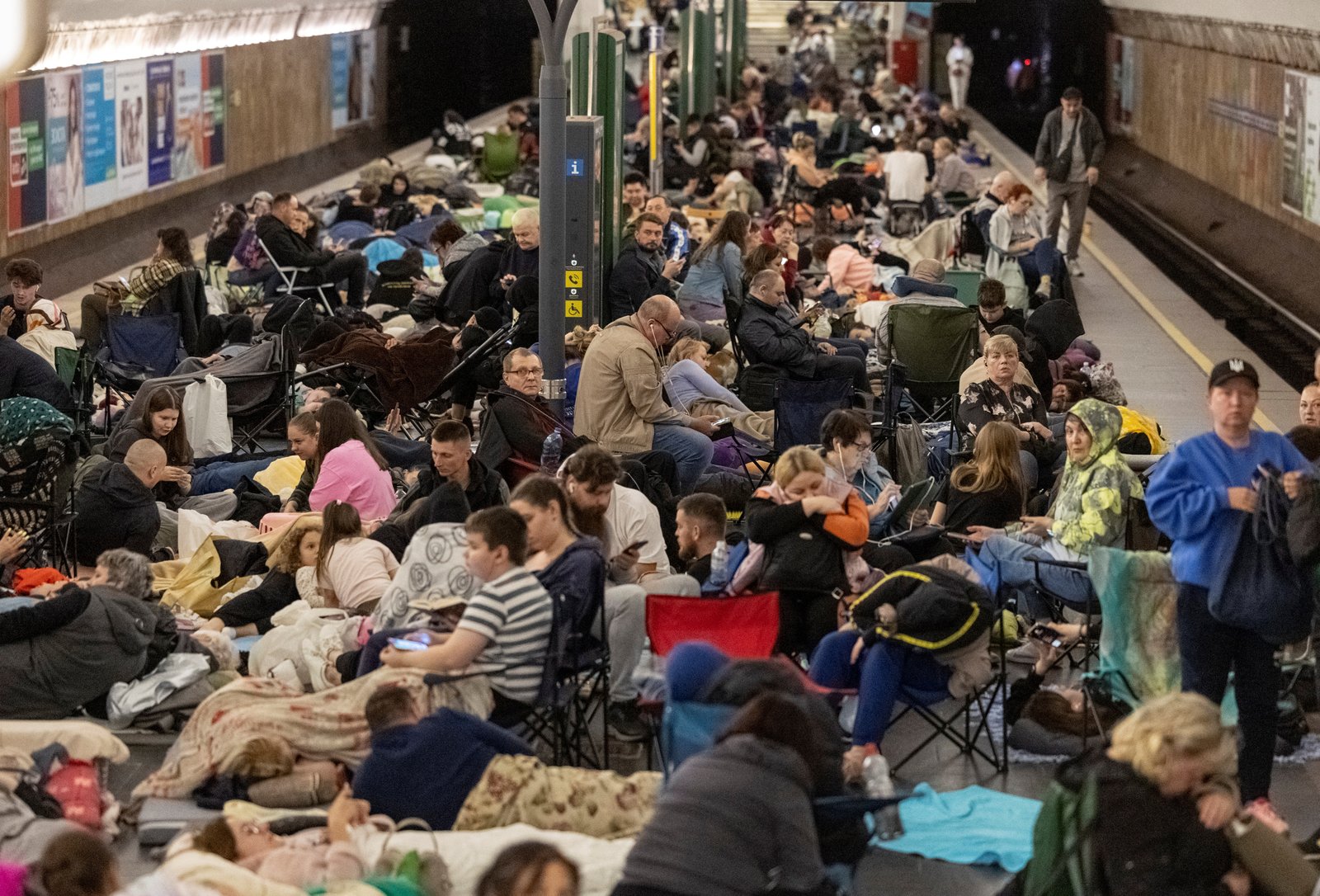 People sheltering underground during missile strikes in Kyiv