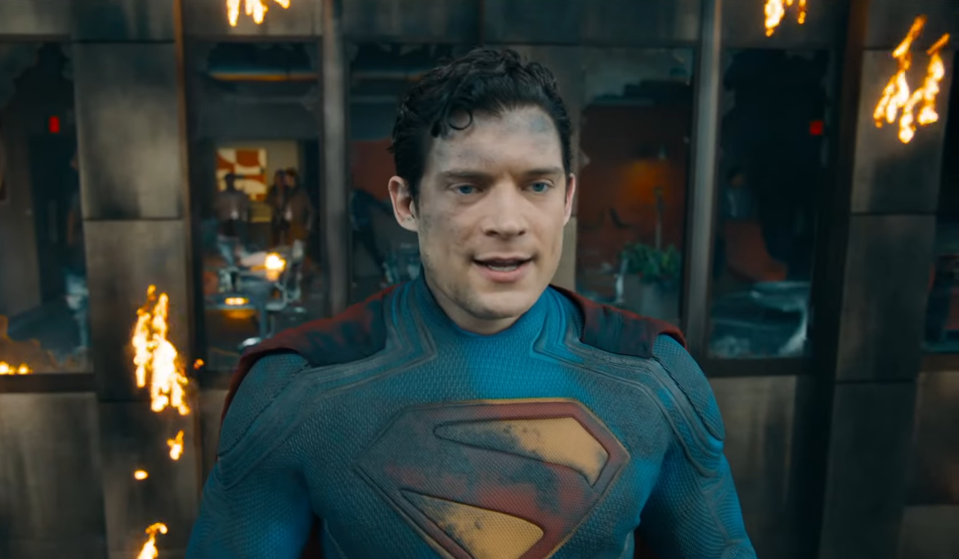 Superman soaring above cityscape