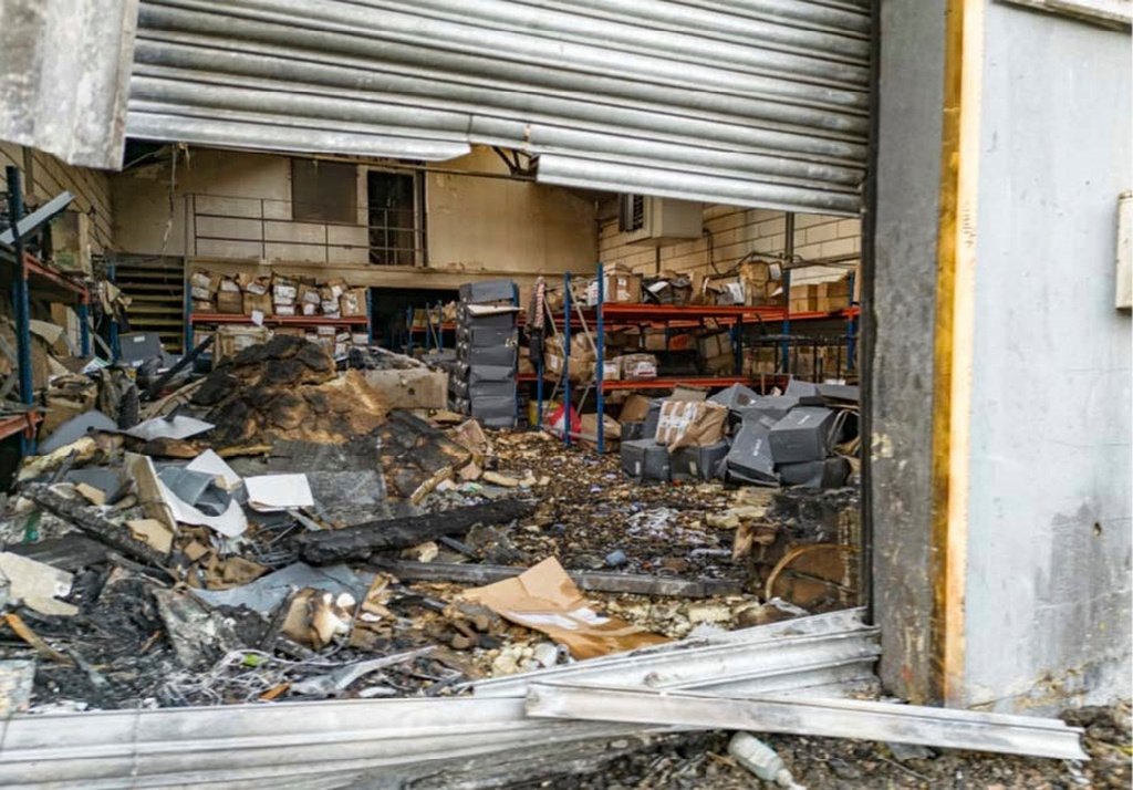 damaged items inside an east London warehouse