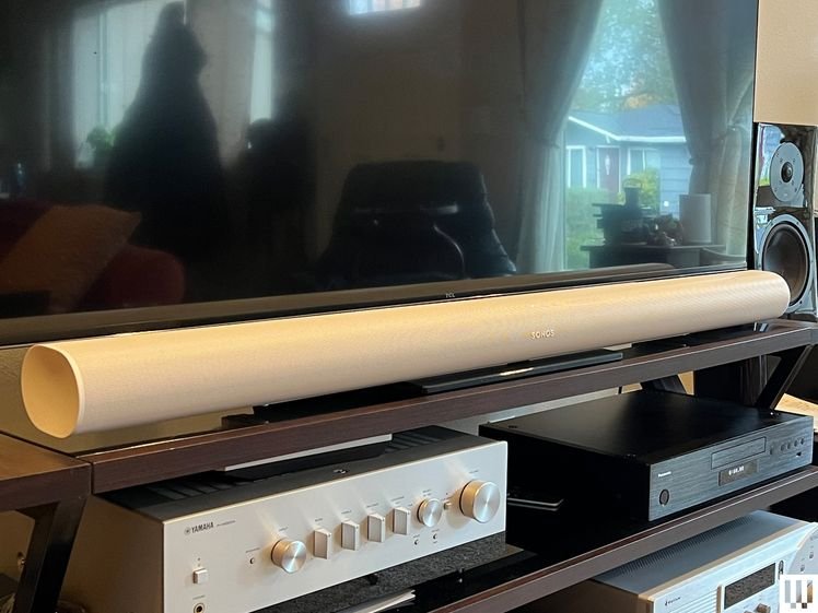 Sonos Arc Ultra Soundbar, a long white speaker below a flat screen tv