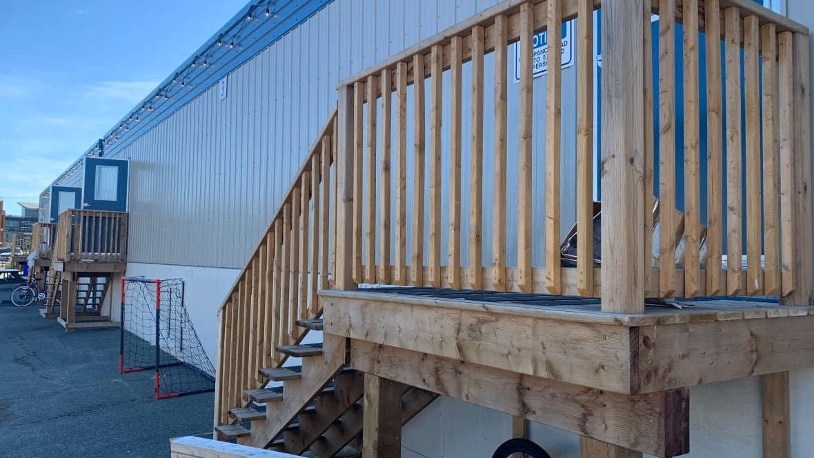 Modular housing units featuring wooden staircases