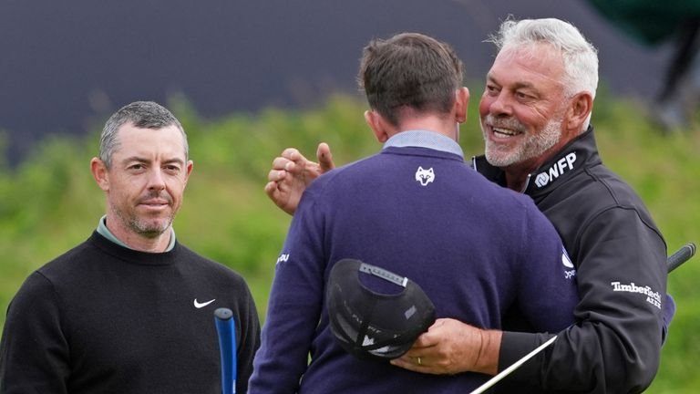 Darren Clarke practicing golf alongside Tom McKibbin