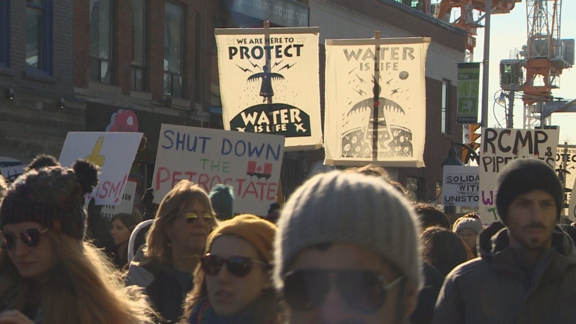 Protesters advocating for clean water in an Indigenous community