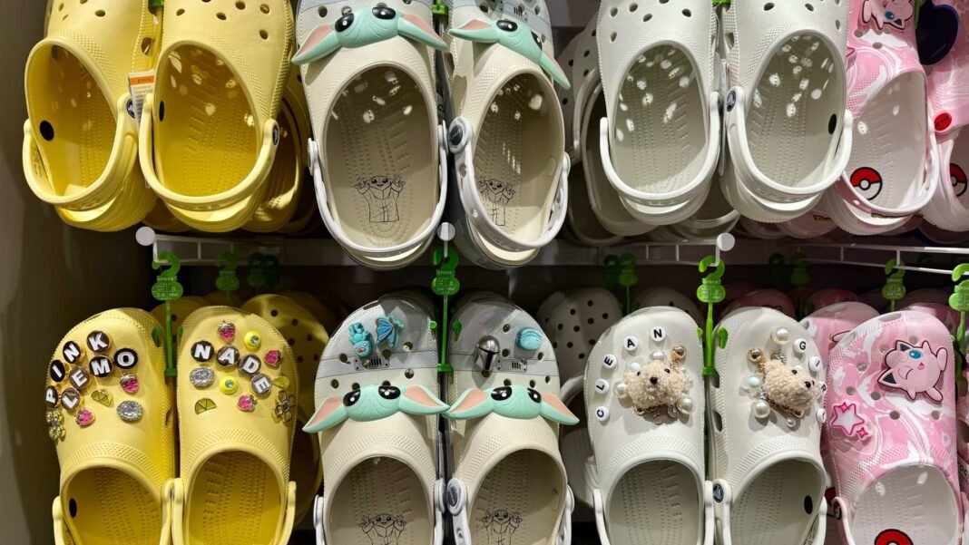 Crocs CEO Warns of Tough Consumer Climate, Announces Major Order Cuts for H2