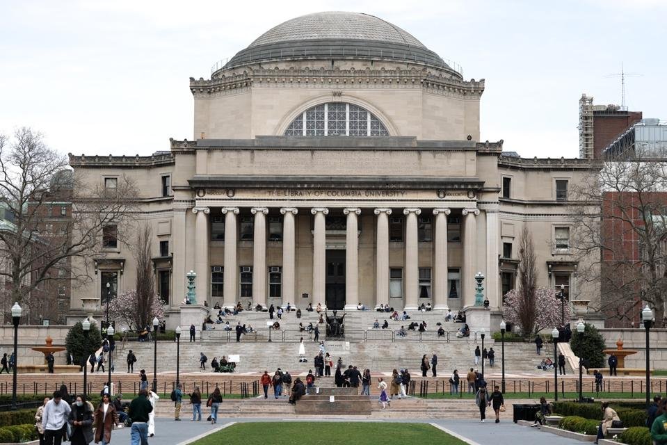 students walking across university campus
