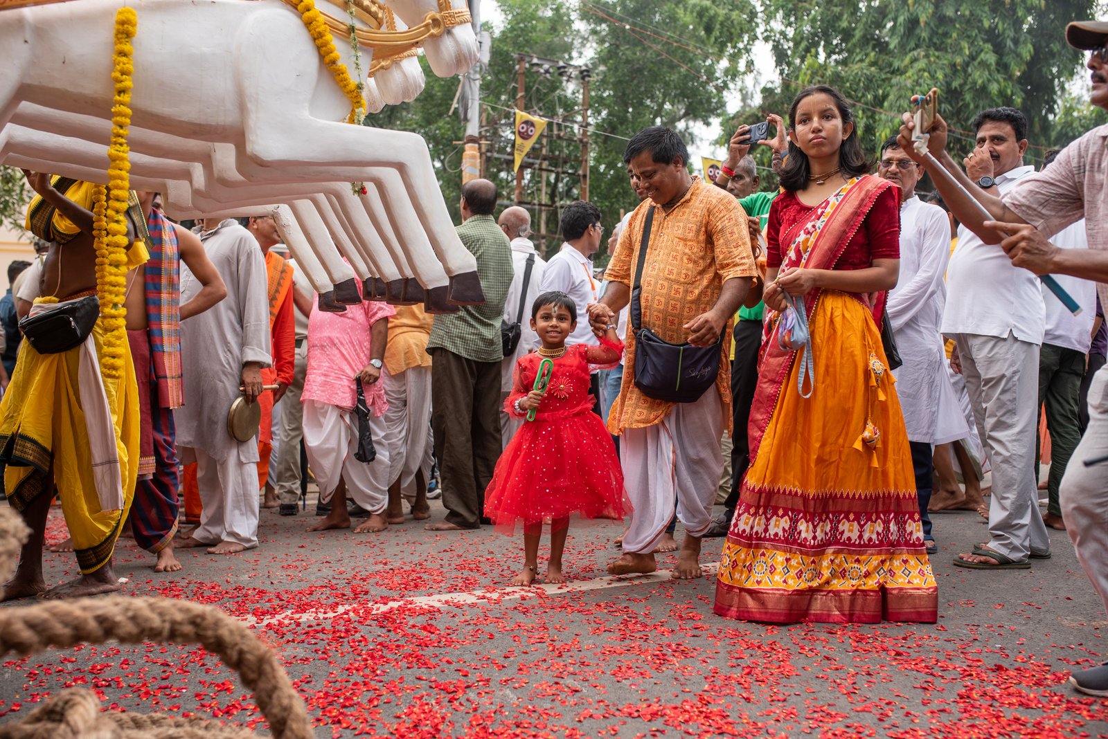 Family attending Rath Yatra festival at new shrine site