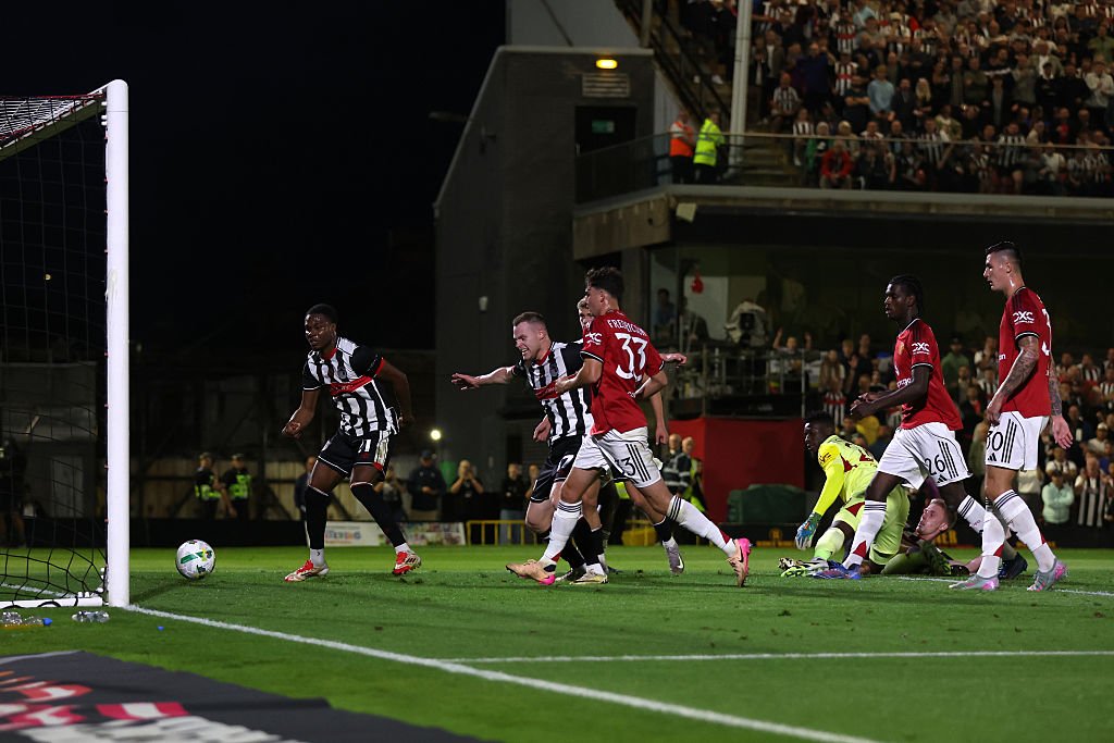 Tyrell Warren scoring for Grimsby Town against Manchester United