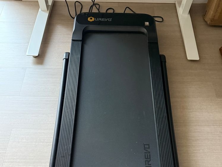Urevo Strol 2S Pro treadmill beneath standing desk