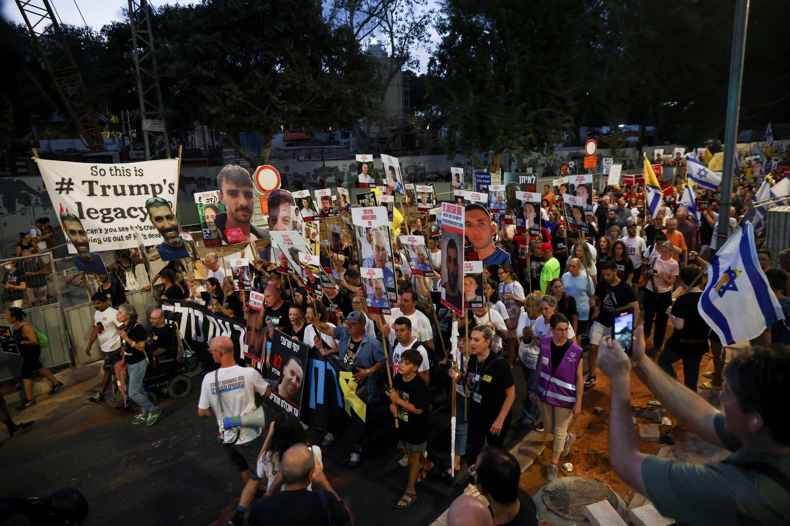 Crowd protesting against war violence demanding ceasefire