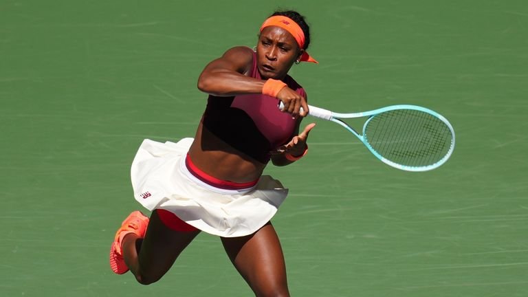Coco Gauff returning a shot at US Open third round