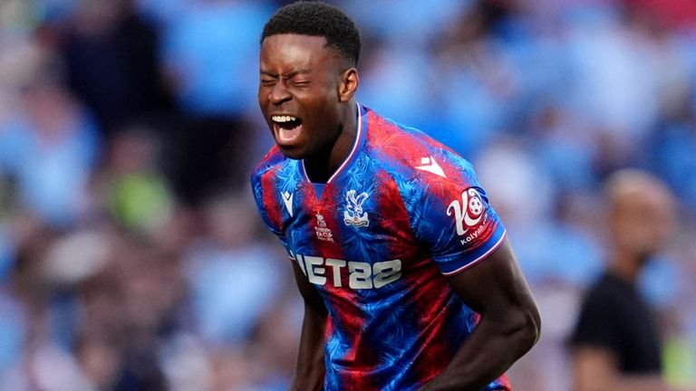 marc Guehi celebrating after winning FA Cup with crystal Palace
