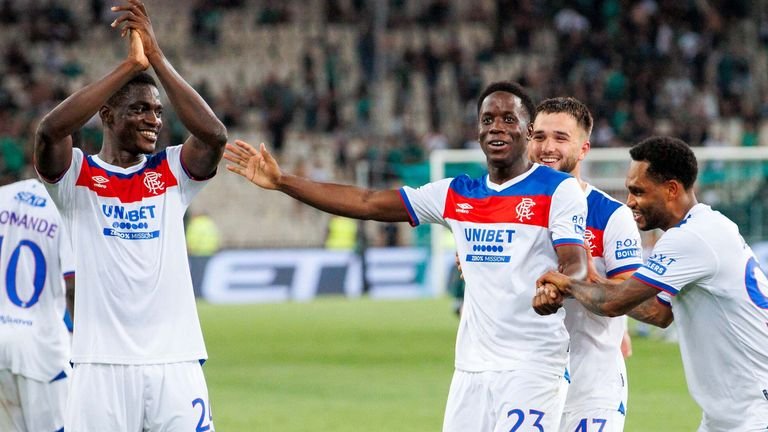 Djeidi Gassama celebrating goal alongside teammates Danilo and Nicolas Raskin