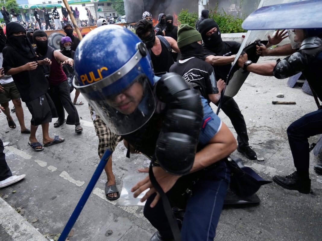 More than 200 arrested after anticorruption protests in Philippines