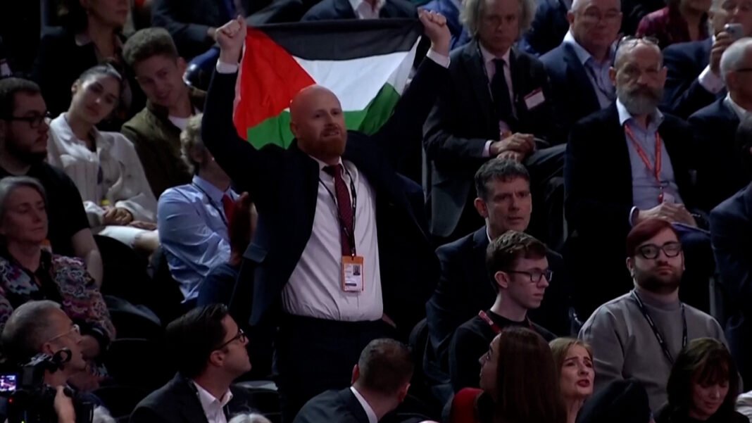 Pro-Palestinian Protester Storms UK Finance Minister’s Speech, Igniting Fierce Chaos