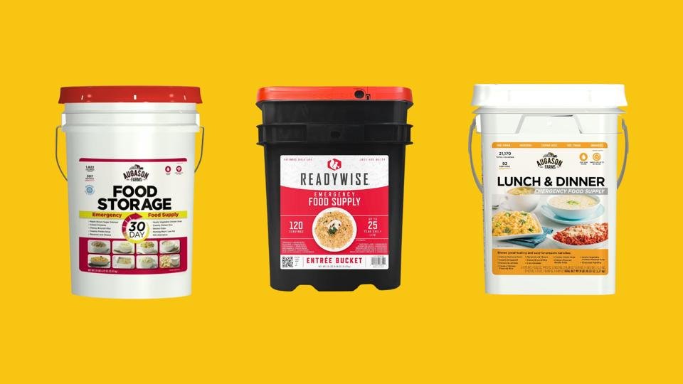 Buckets filled with various emergency food supplies arranged against radiant background.