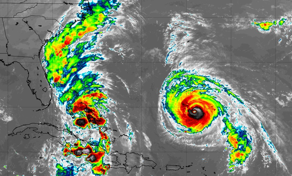 Satellite image showing Hurricane Humberto alongside developing system likely becoming Tropical Storm or hurricane Imelda
