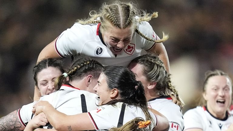 Canadian women's rugby team celebrating semi-final victory