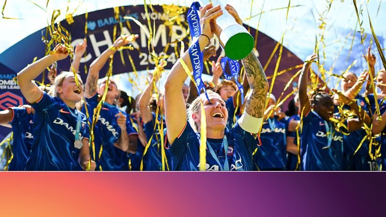 Chelsea Women lifting trophy celebrating continued success