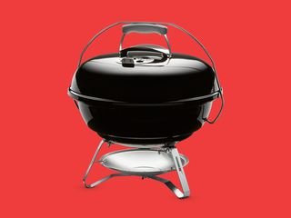 Weber Jumbo joe portable kettle-style charcoal grill closed lid view
