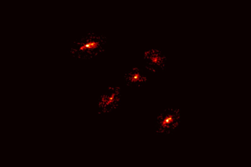 A Newly Discovered ‘Einstein’s Cross’ Reveals the Existence of a Giant Dark Matter Halo