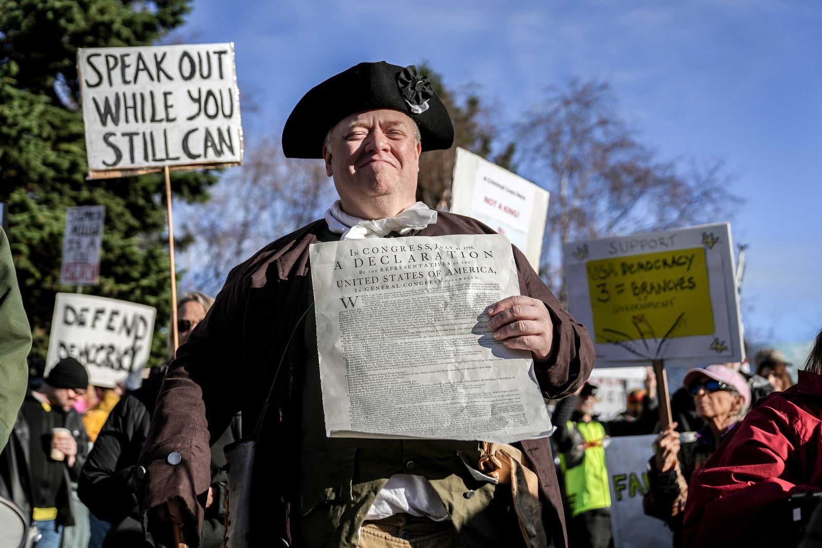 Protester dressed in ancient costume during Anchorage rally