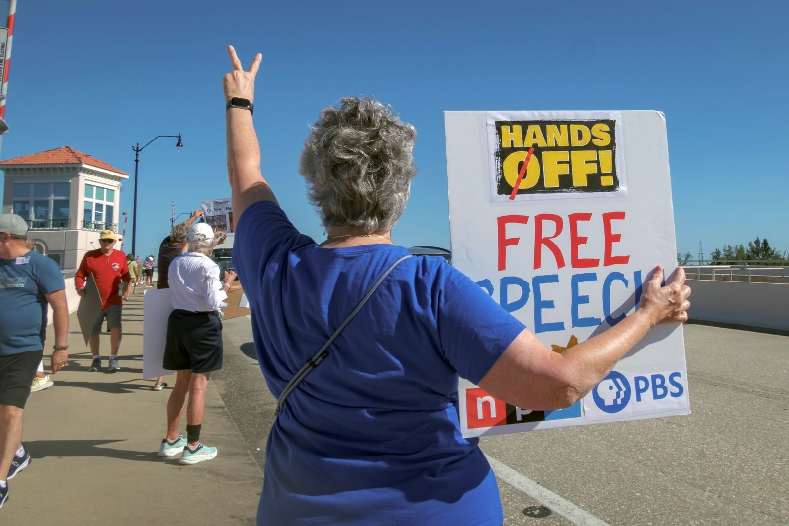 Protester holding sign in Venice demonstration