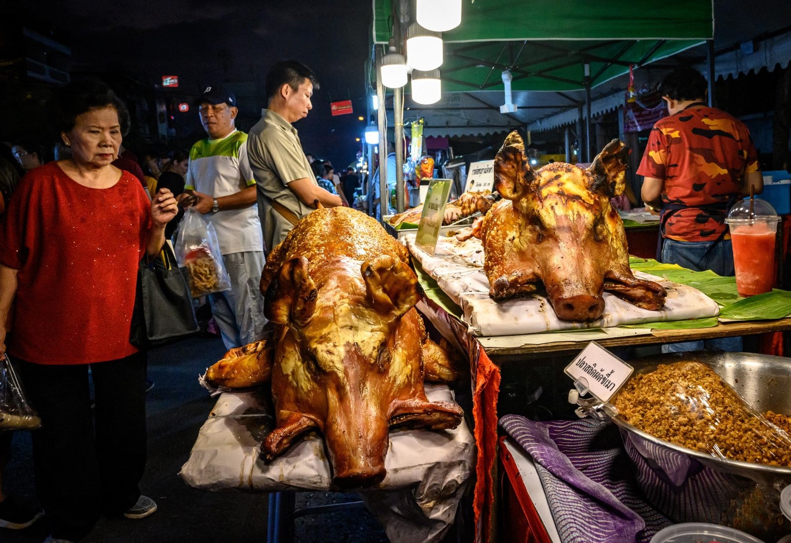 Street vendor selling roasted pork