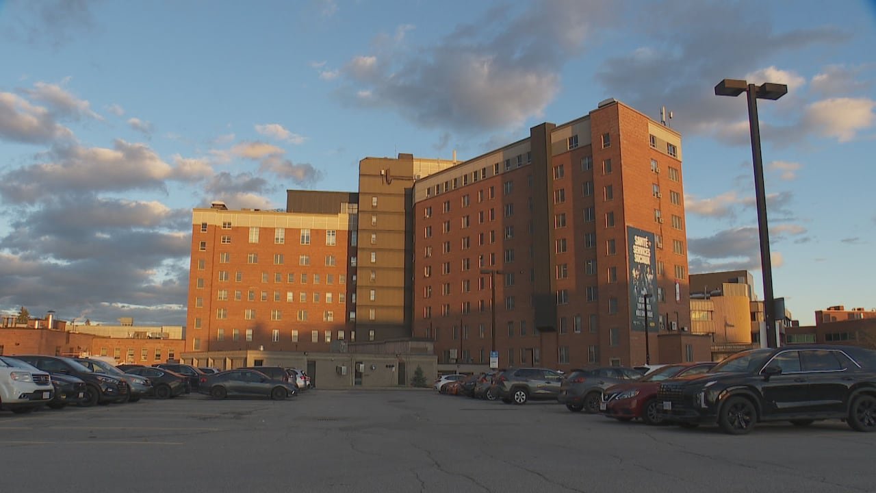 Doctors protesting inside stadium holding lit phones