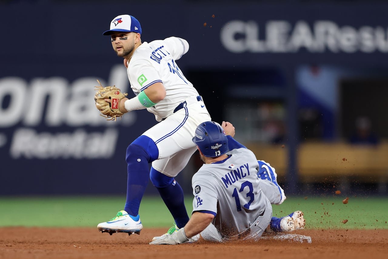 Baseball player preparing for throw during intense game moment