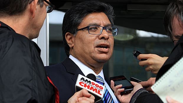 Deepak Paradkar speaking at press conference