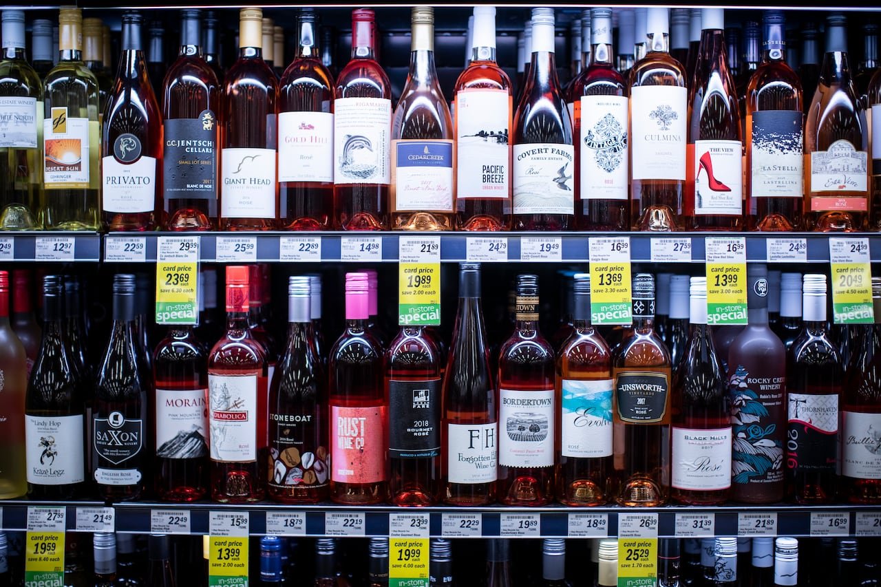 shelves stocked with various bottles of wine