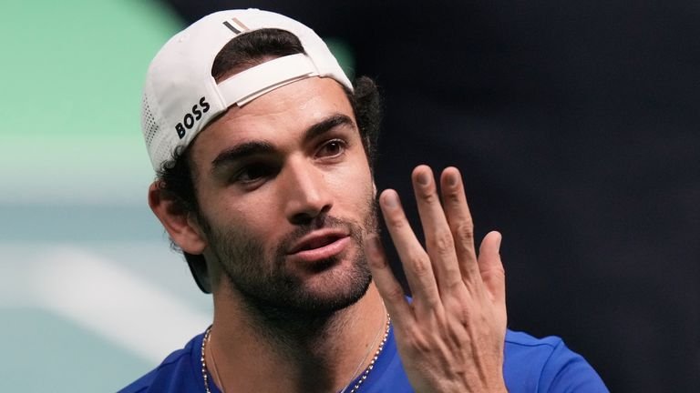 Matteo Berrettini celebrating after winning a Davis Cup final singles match against Pablo Carreno Busta