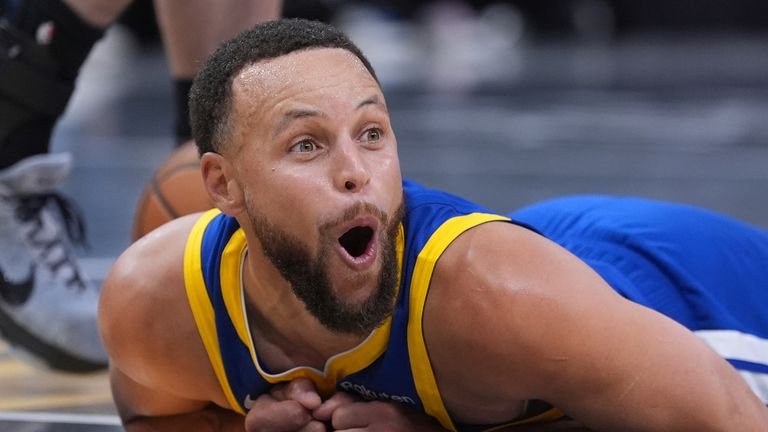 Golden State Warriors' Steph Curry celebrating after scoring