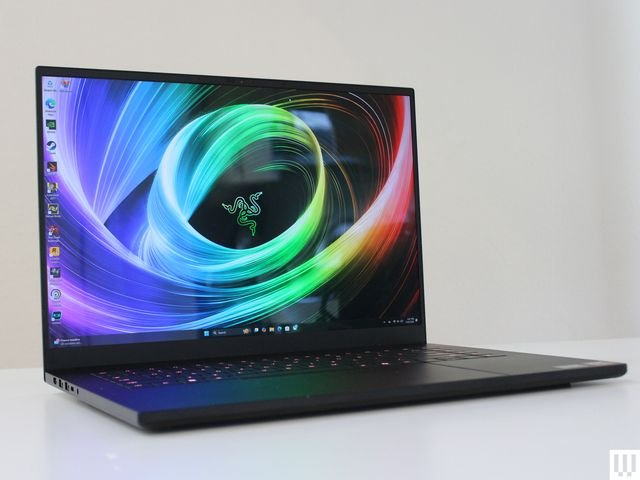 Front view of Razer Blade 16 2025 edition, a slim black laptop, with abstract art on the screen