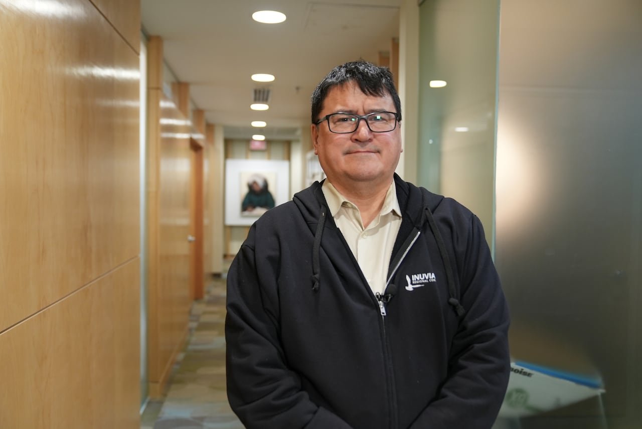 Duane Smith smiling indoors during interview
