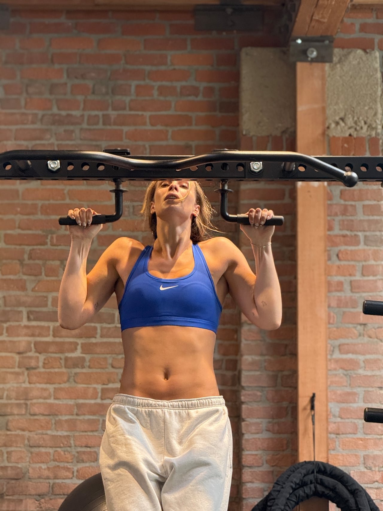 Athlete training alone at public pool.