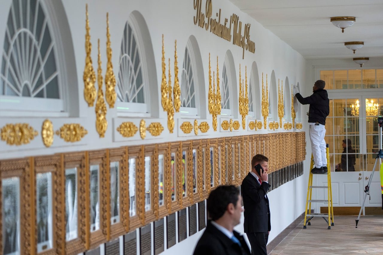Man working on Presidential Walk Of Fame installation