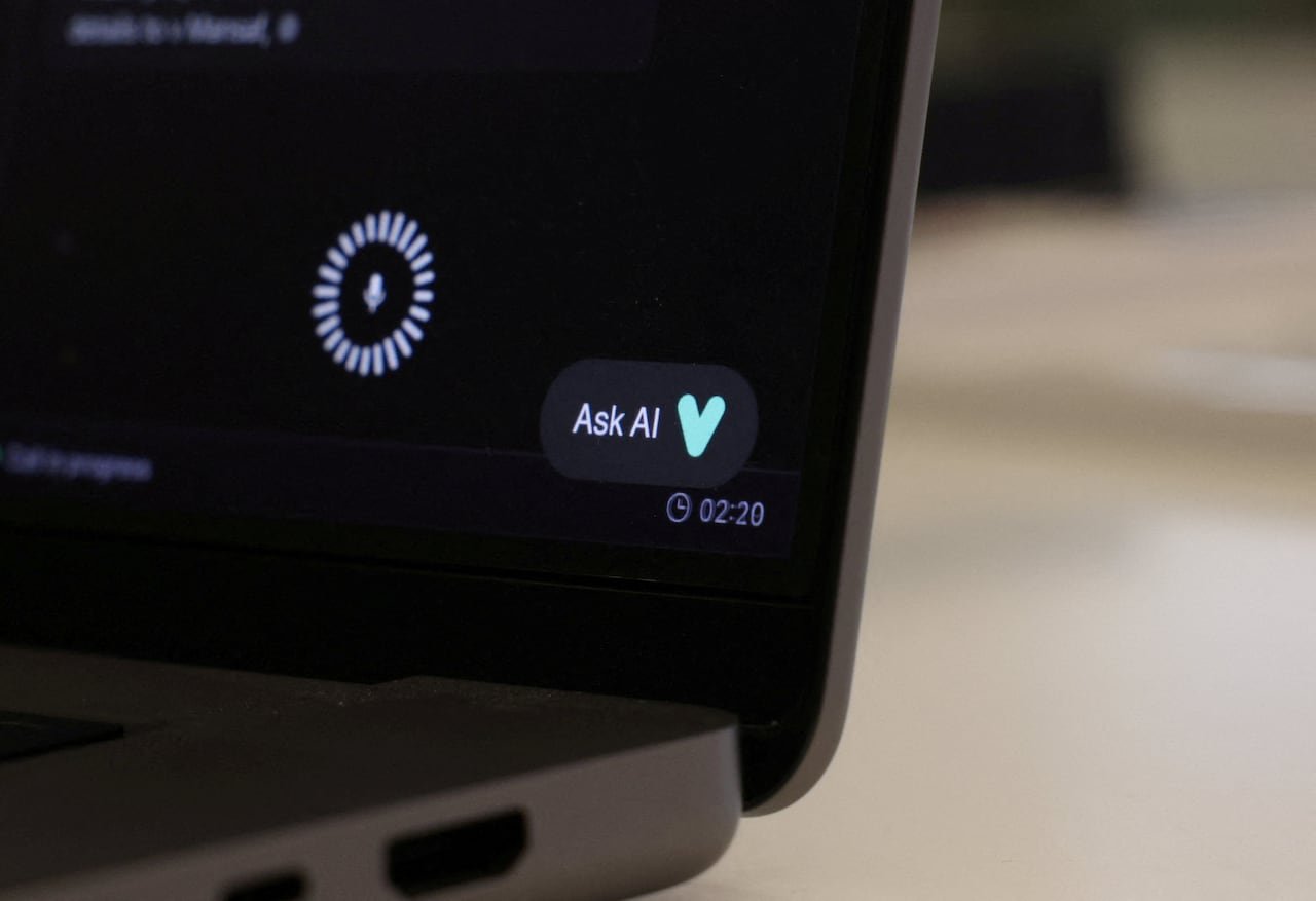 Laptop screen displaying 'ask AI' prompt