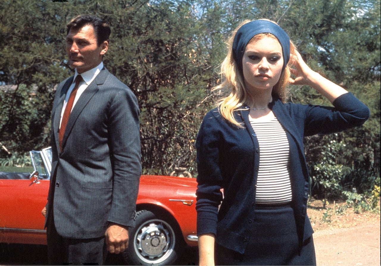 Bardot filming Le Mepris with Jack Palance