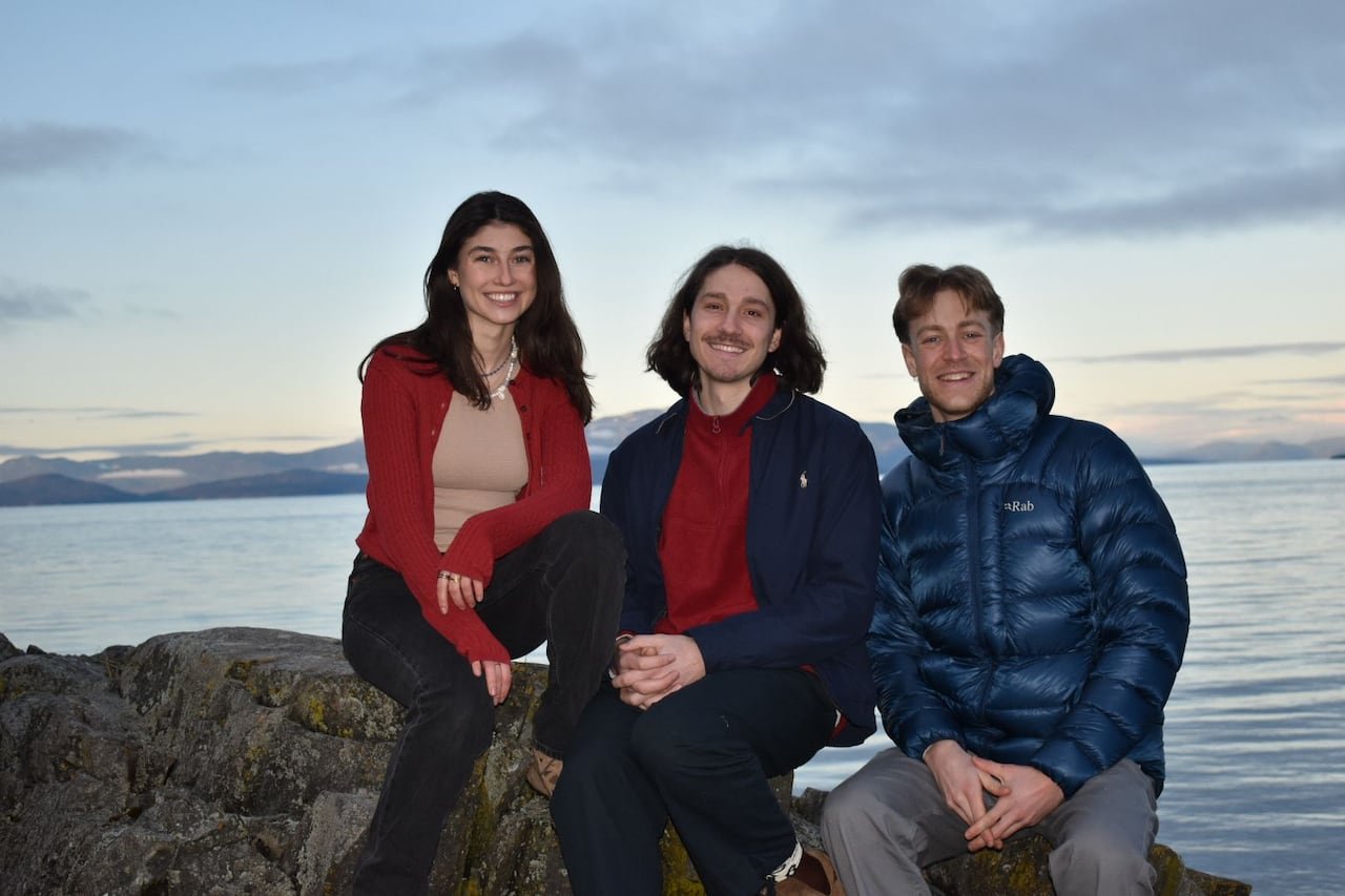 Young entrepreneurs collaborating near waterfront