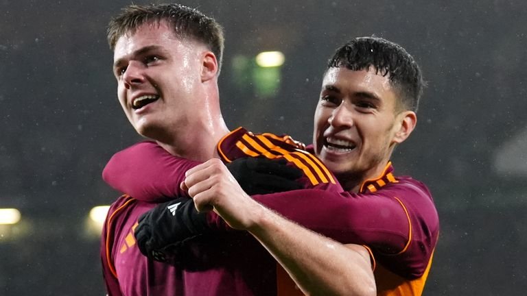 Evan Ferguson celebrates scoring Roma's second goal at Celtic in the Europa League