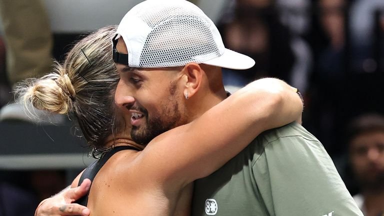 Nick Kyrgios and Aryna sabalenka embrace at net after Battle of the Sexes match