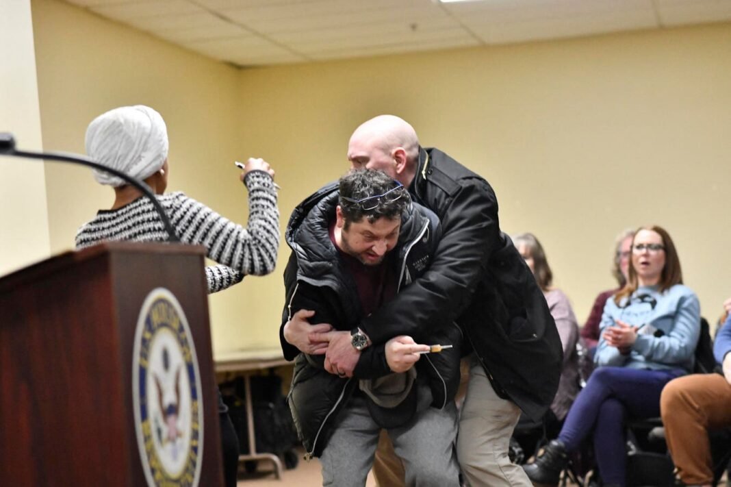 Unbelievable Attack: Ilhan Omar Doused with Mysterious Substance During Town Hall Meeting