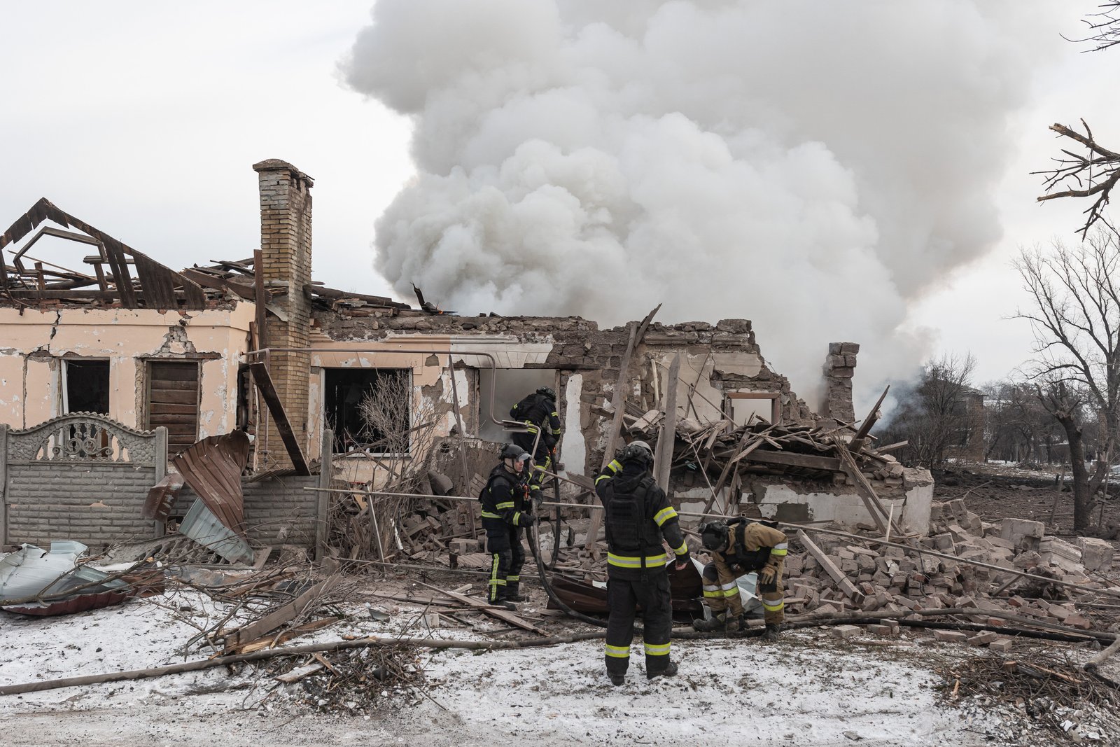 Firefighters extinguishing blaze at residential building after russian airstrike in Druzhkivka, Donetsk region, Ukraine